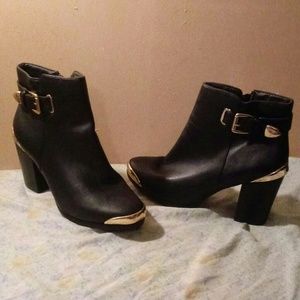 Black and gold booties